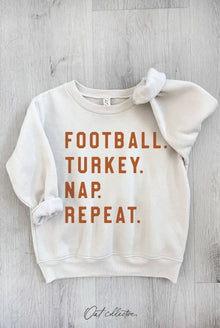  FOOTBALL. TURKEY. NAP. REPEAT. TODDLER SWEATSHIRT