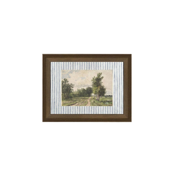Framed artwork of a landscape with trees on a striped background